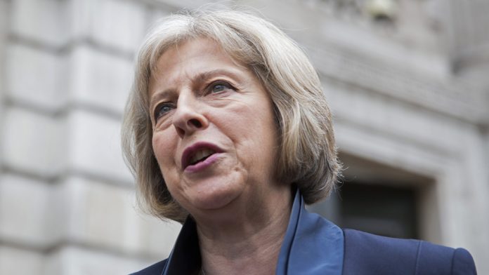 Britain's Home Secretary Theresa May gives a statement to the media after attending a COBRA National Emergencies Committee meeting at the Cabinet Office in London
