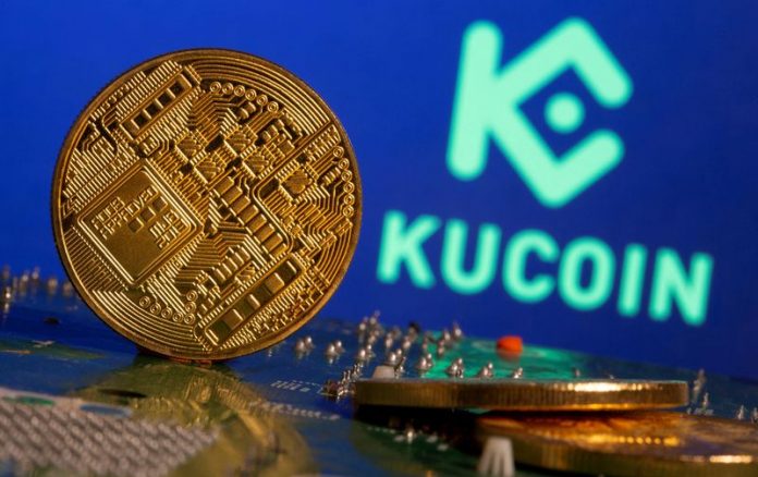 FILE PHOTO: Representations of cryptocurrency is seen in front of a Kucoin logo in this illustration